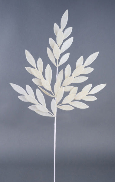 a white sculpture of a leaf on a gray background