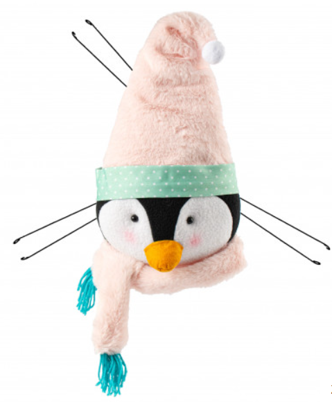 a stuffed penguin wearing a hat and scarf