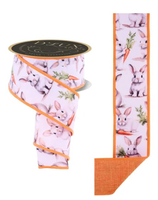 a ribbon with a repeating pattern of rabbits and carrots.