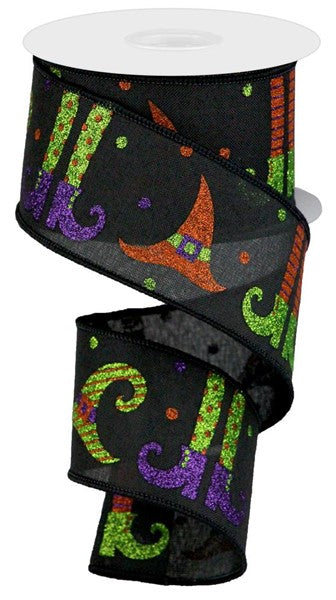a roll of halloween ribbon with a witch on it