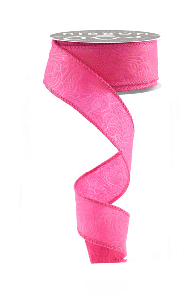A pink, embossed ribbon is shown against a white background.