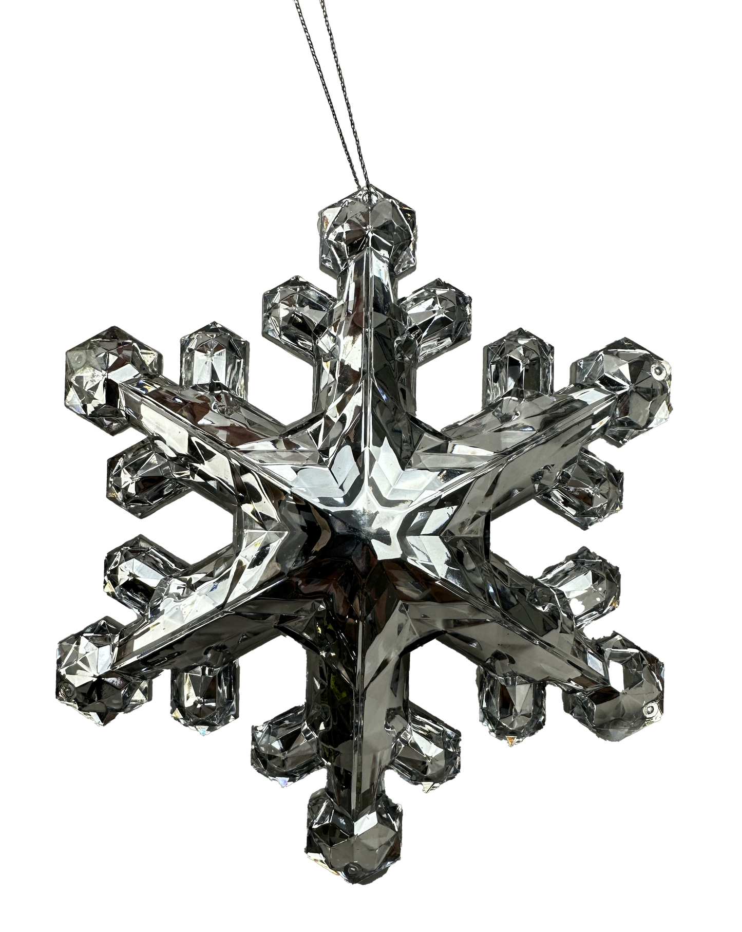 A sparkling crystal snowflake ornament is suspended against a black background.