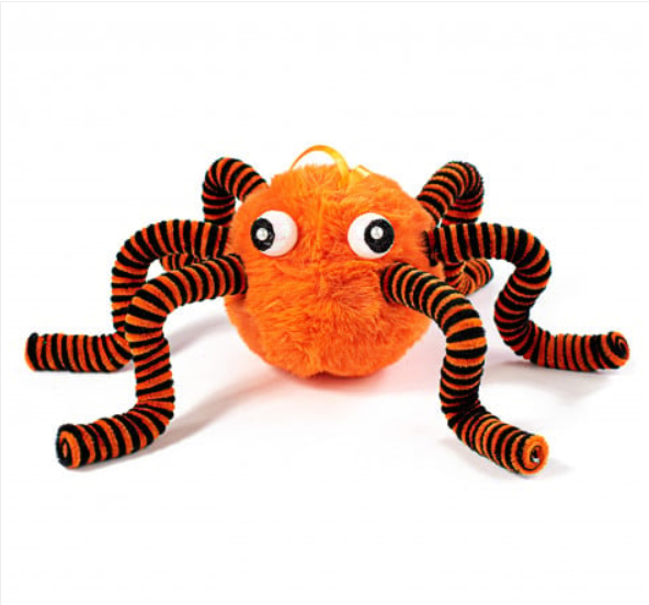an orange stuffed animal with black stripes on it's legs