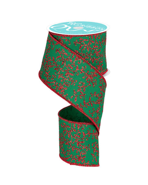 a roll of green and red ribbon on a white background