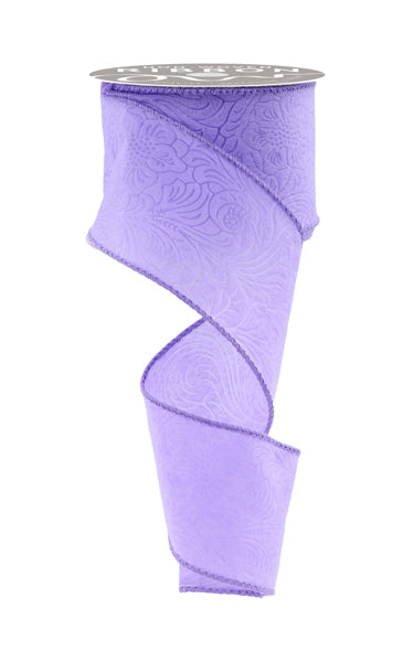 a roll of purple ribbon on a white background