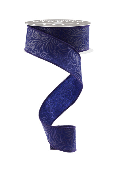 a roll of blue ribbon on a white background