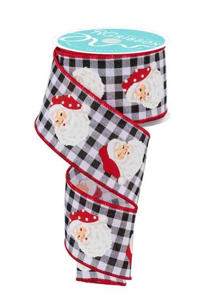 a roll of ribbon with santa claus on it