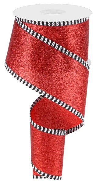 a red ribbon with black and white stripes