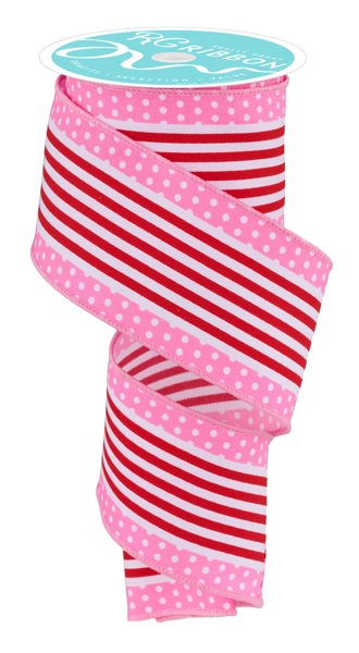 a roll of pink and red polka dot ribbon