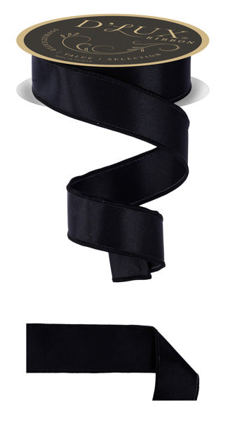 a black ribbon with a gold emblem on it