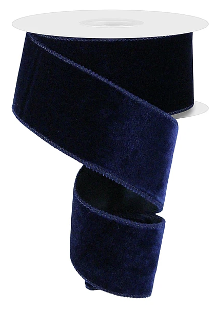 A roll of dark blue velvet ribbon.