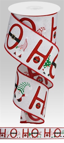 a roll of white christmas ribbon with red letters