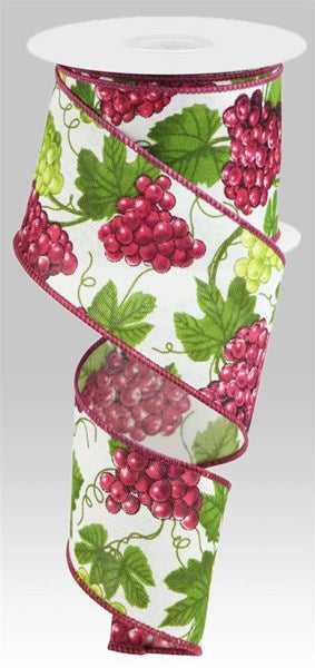 a roll of ribbon with grapes on it