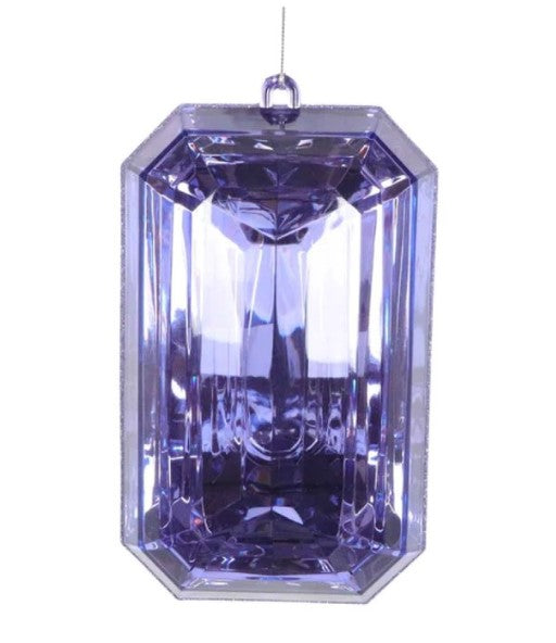 a purple crystal hanging ornament on a white background