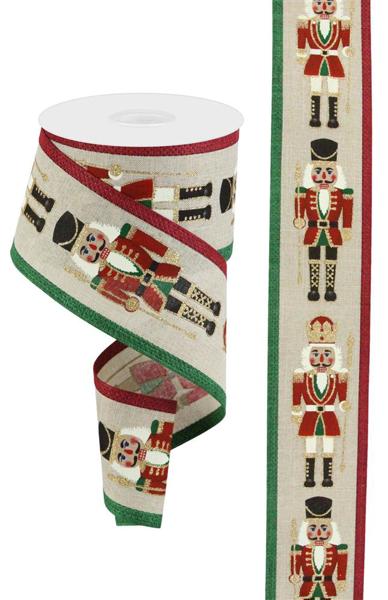 a roll of christmas ribbon next to a roll of tape