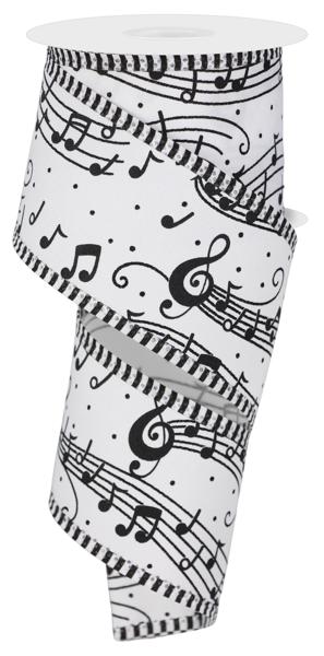 a white cup with musical notes on it