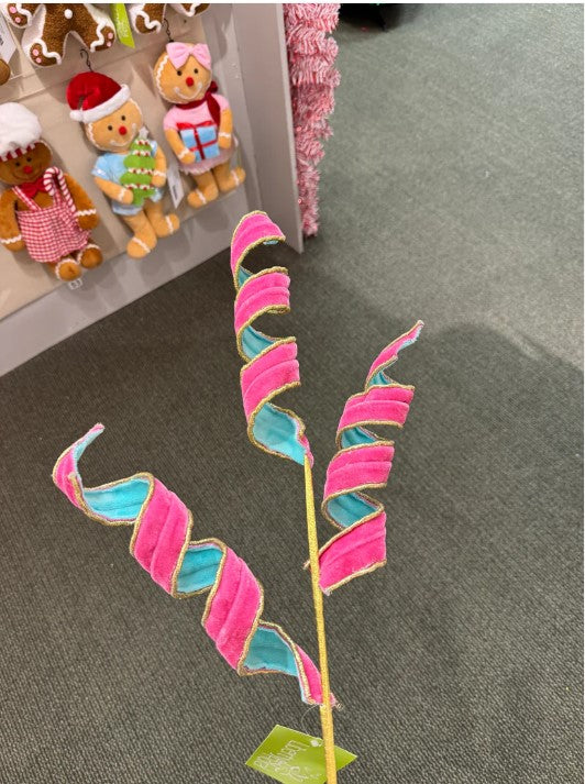 a pink and blue plant in a vase