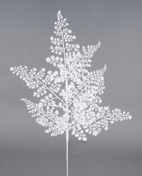 a white tree with white leaves on a gray background