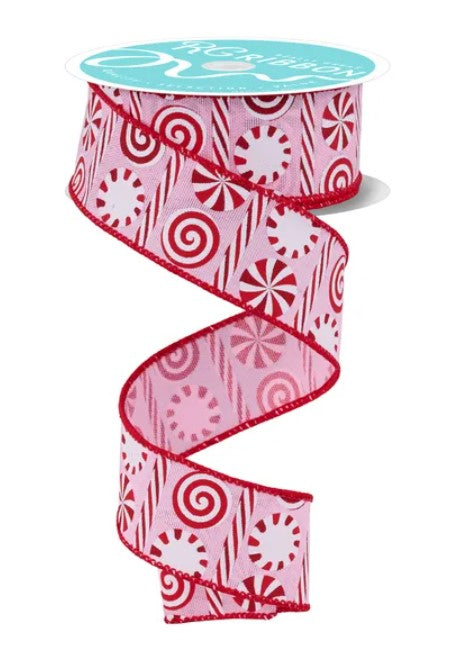 A pink and red spiral-patterned ribbon is shown, with a turquoise label on top.