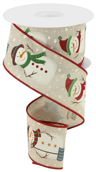 a roll of christmas ribbon with snowmen on it