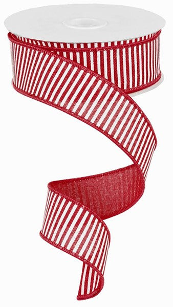 a roll of red and white striped ribbon