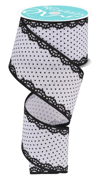 a roll of black and white polka dot ribbon
