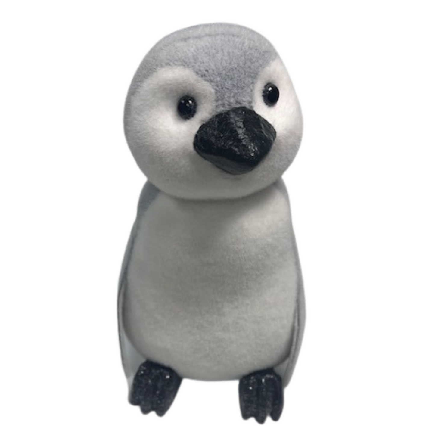 a small stuffed penguin with a black beak