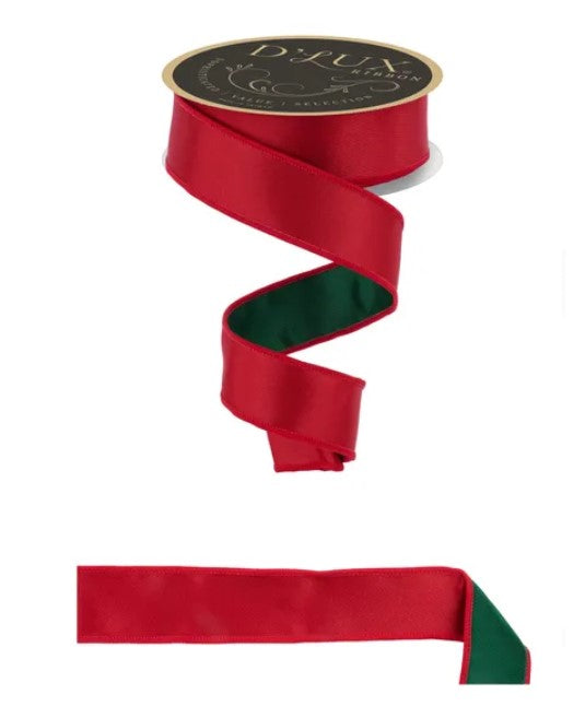 a red ribbon with a green center, and it is attached to a black circular label.