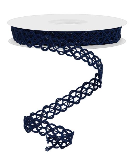 a spool of dark blue ribbon on a white background