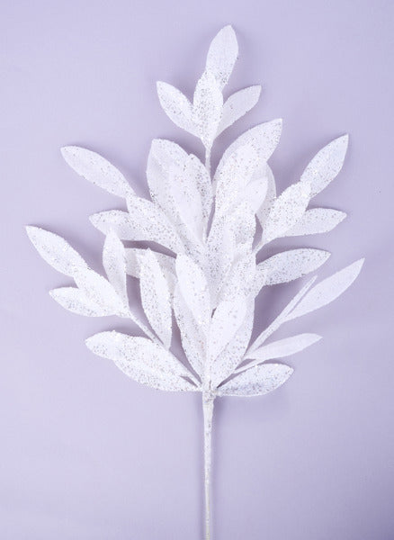 a white plant with white leaves on a purple background