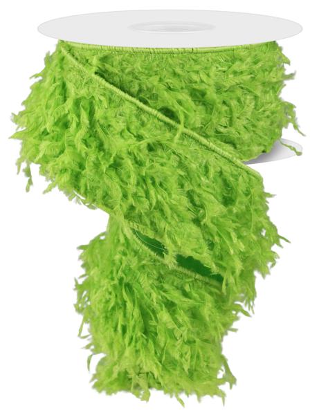 a spool of neon green yarn on a white background