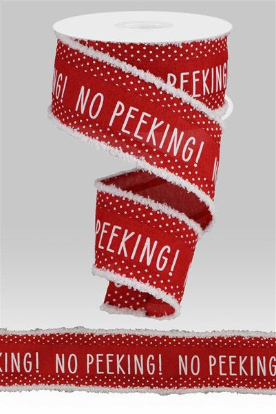 a roll of red and white polka dot ribbon