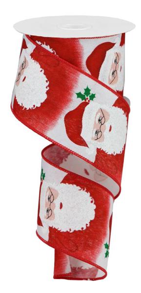 a roll of christmas ribbon with santa claus on it