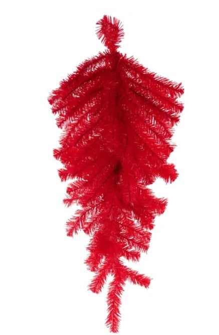 A tall, red, spiky Christmas tree with numerous branches and a pointed top.