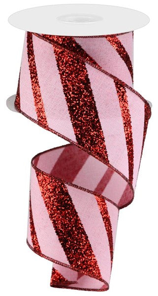a roll of pink and red glitter ribbon