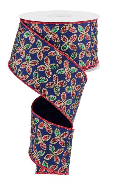 a roll of ribbon with a flower design on it