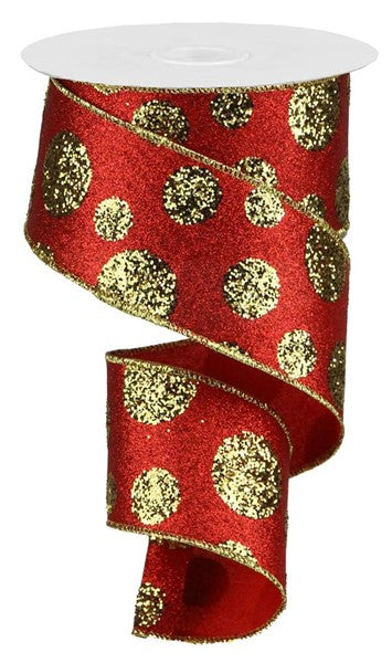 a roll of red and gold glitter ribbon