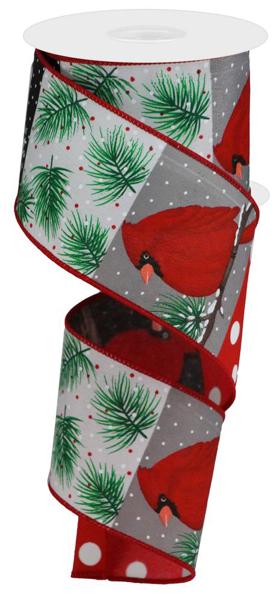 a roll of christmas ribbon with a cardinal on it