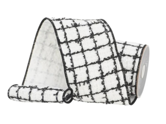 a roll of black and white wash cloth