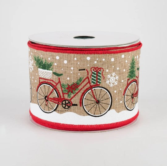 a roll of christmas ribbon with a bicycle on it