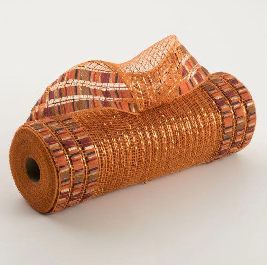 a roll of orange woven material on a white surface