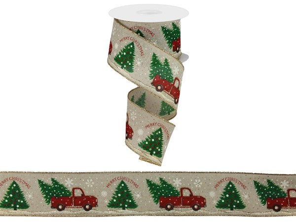 a roll of christmas ribbon with a truck and trees on it