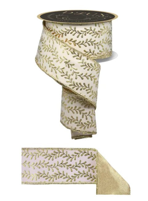a decorative gold and white leaf-patterned ribbon with a black label.