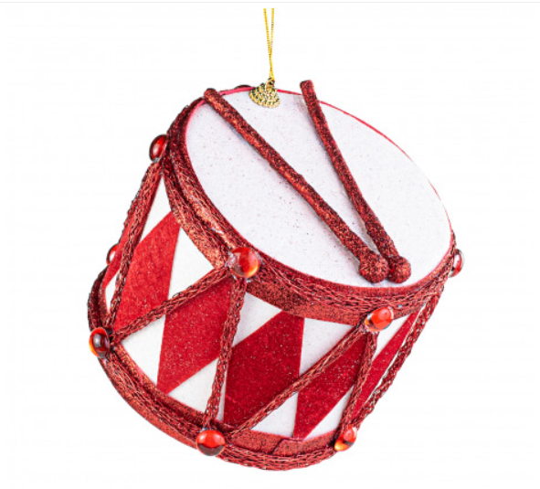 a red and white ornament hanging from a string