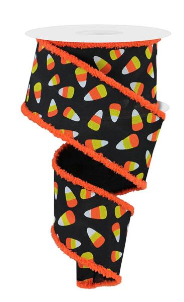 a roll of halloween candy on a white background