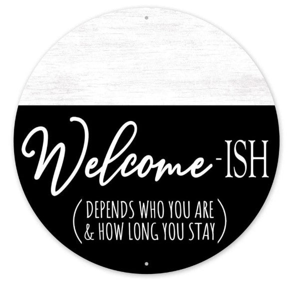 a sign with the text "Welcome-ISH" and a subtitle "Depends Who You Are & How Long You Stay".