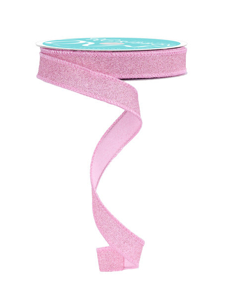 a roll of pink glitter ribbon on a white background