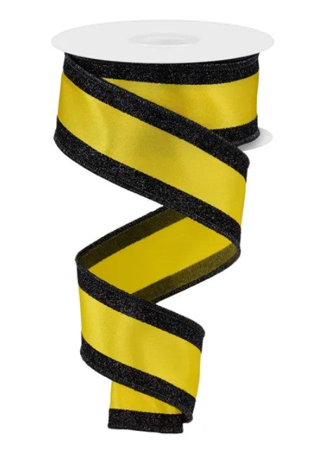 A yellow and black striped ribbon is shown against a white background.