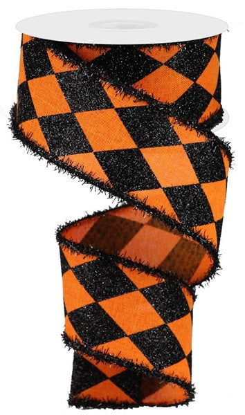 a roll of black and orange checkered ribbon