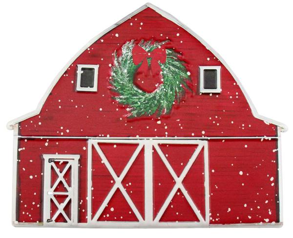 a red barn with a wreath on it